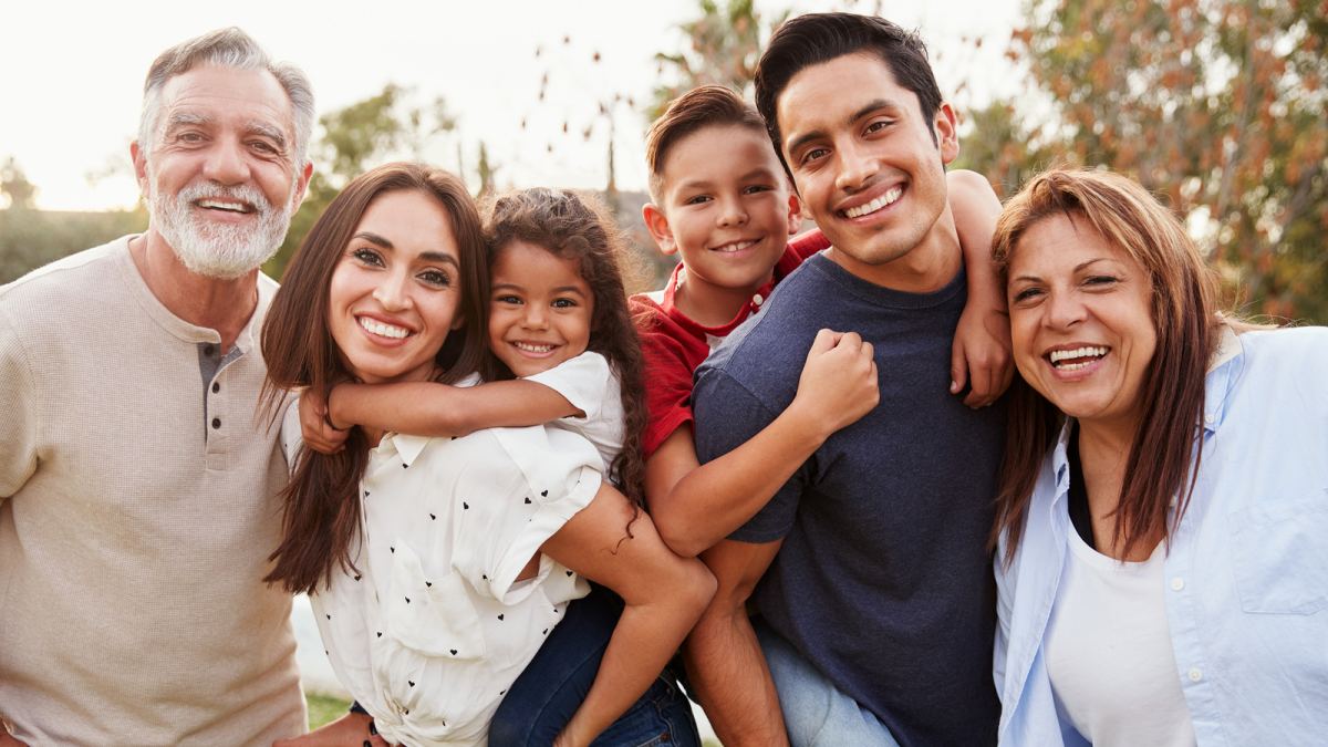 Hispanic family happy with dental services after a root canal